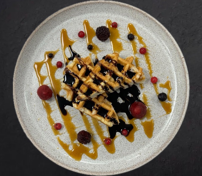 Protein Waffle with Raspberry Syrup & Mixed Berries
